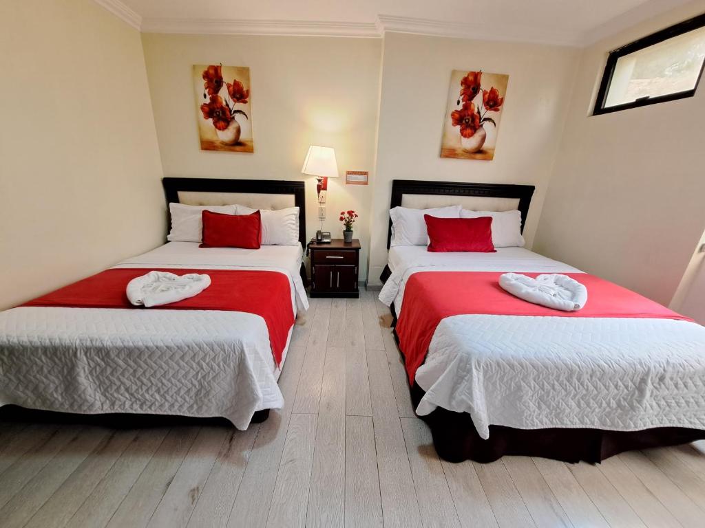 Postel nebo postele na pokoji v ubytování Hotel Loja Bella
