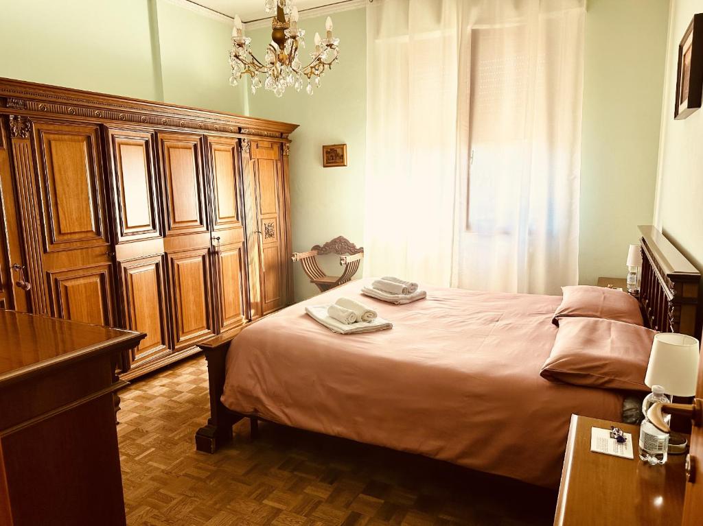 A bed or beds in a room at Affittacamere Umberto&Marisa