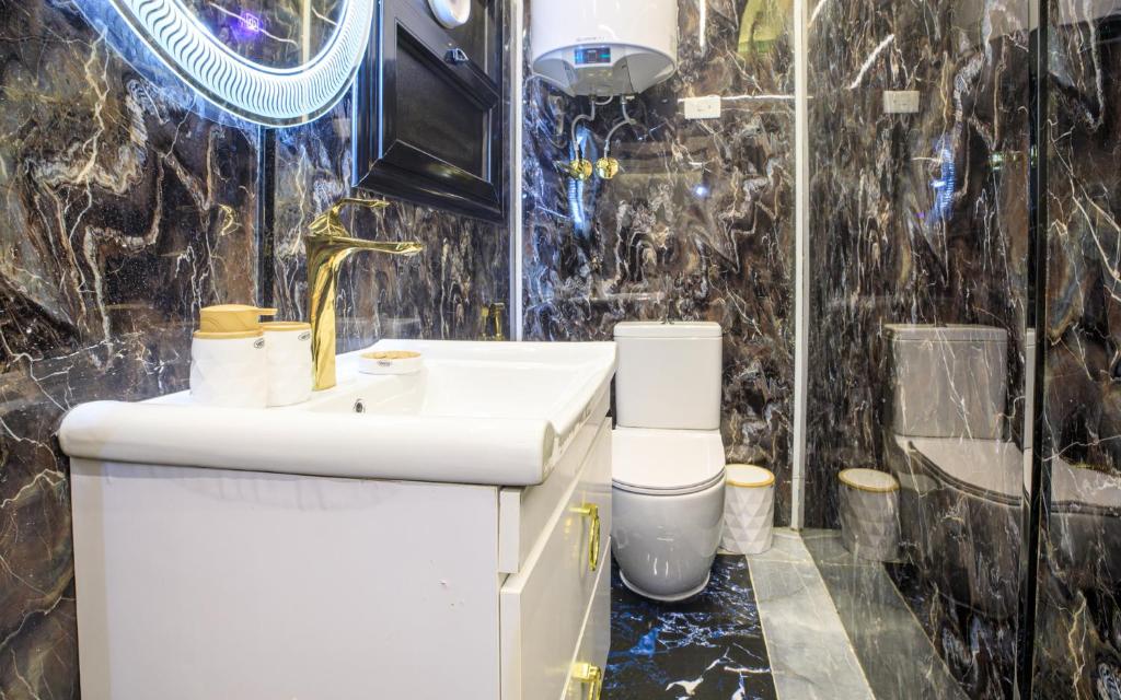 Koupelna v ubytování Piccolo Mondo Boutique Hotel