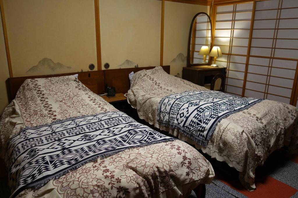 Postel nebo postele na pokoji v ubytování Natural Mind Tour - Vacation STAY 94017v