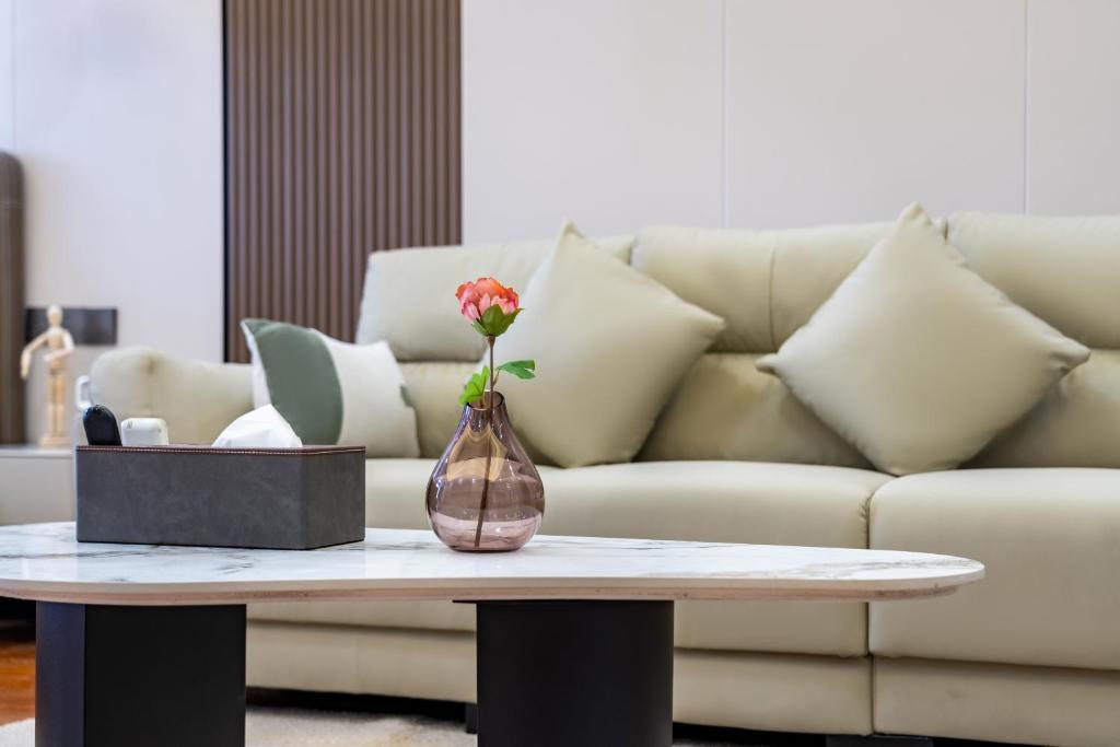 Posezení v ubytování East Maple International Apartment - Guangzhou Luogang Wanda Plaza Suyuan Metro Station