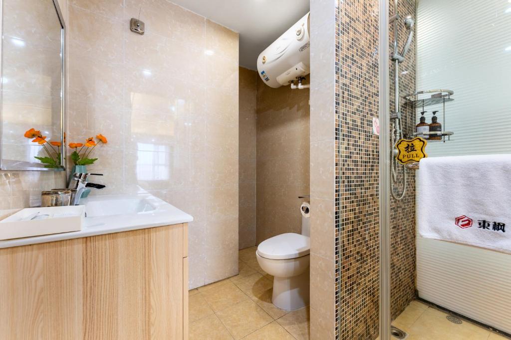 Koupelna v ubytování East Maple International Apartment - Guangzhou Luogang Wanda Plaza Suyuan Metro Station