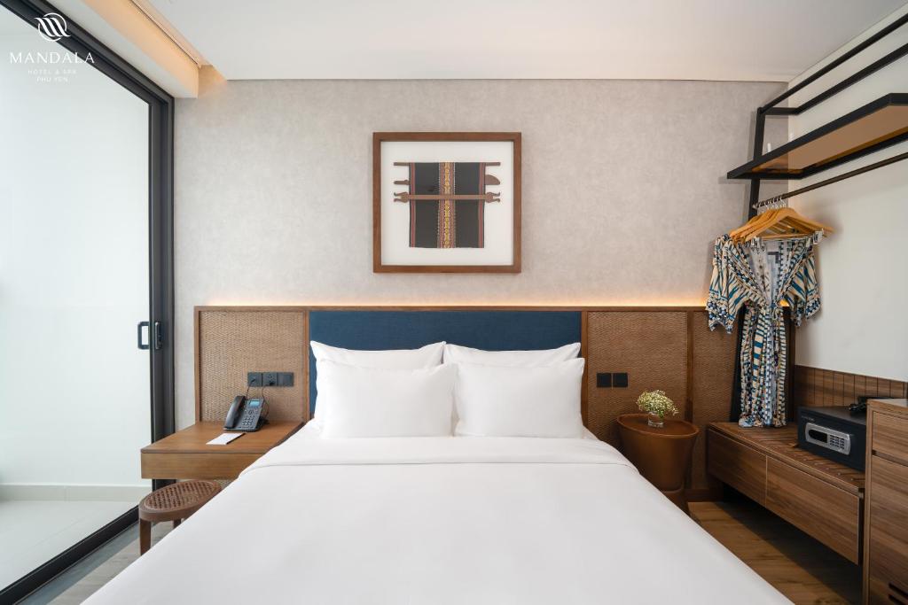 Giường trong phòng chung tại M Continental by Mandala Phu Yen - 24hours Stay