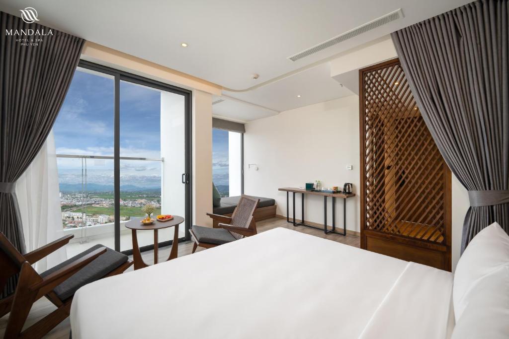 Giường trong phòng chung tại M Continental by Mandala Phu Yen - 24hours Stay