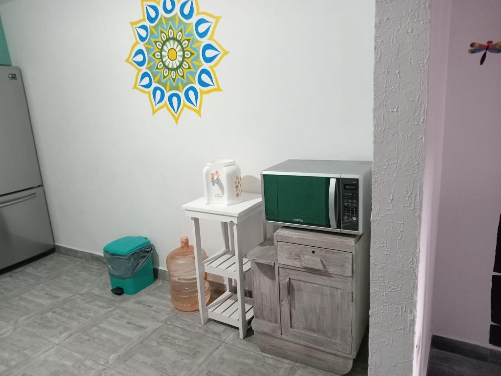 Kuchyň nebo kuchyňský kout v ubytování Casa de los Mandalas 1
