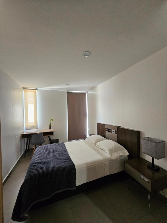 Llit o llits en una habitació de NSI Alameda Park Humboldt Mexico City