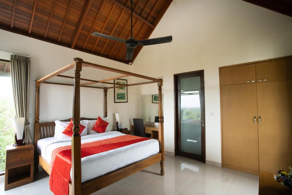 Postel nebo postele na pokoji v ubytování Jimbaran Sea View Villa