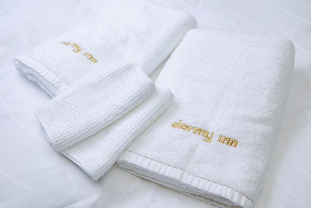 Postel nebo postele na pokoji v ubytování Dormy Inn Express Toyohashi