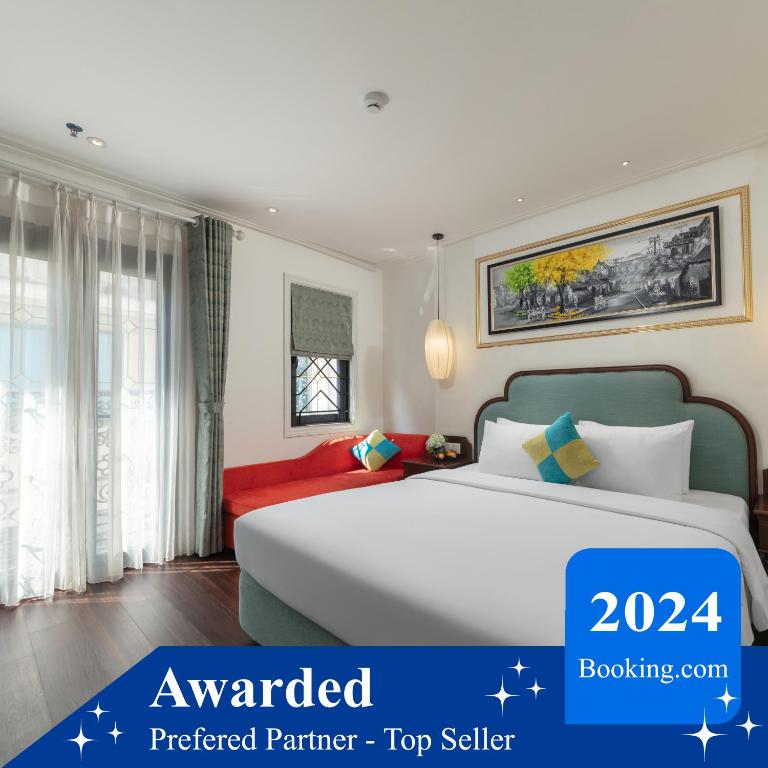 Postel nebo postele na pokoji v ubytování Hanoi Calista Hotel & Spa
