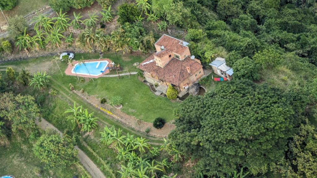 an aerial view of a house with a swimming pool at Ventanas Parapente Boutique - Club House in El Cerrito