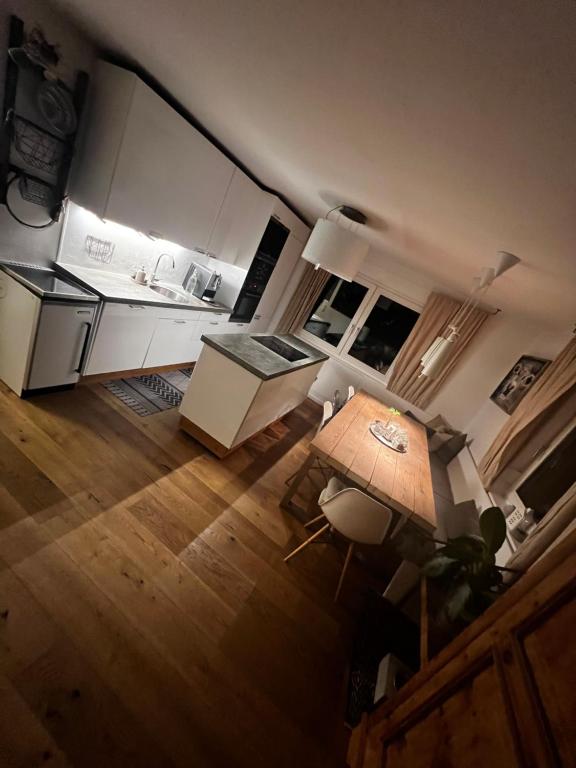 an overhead view of a kitchen and a living room at Flat Tom in Schwaighof