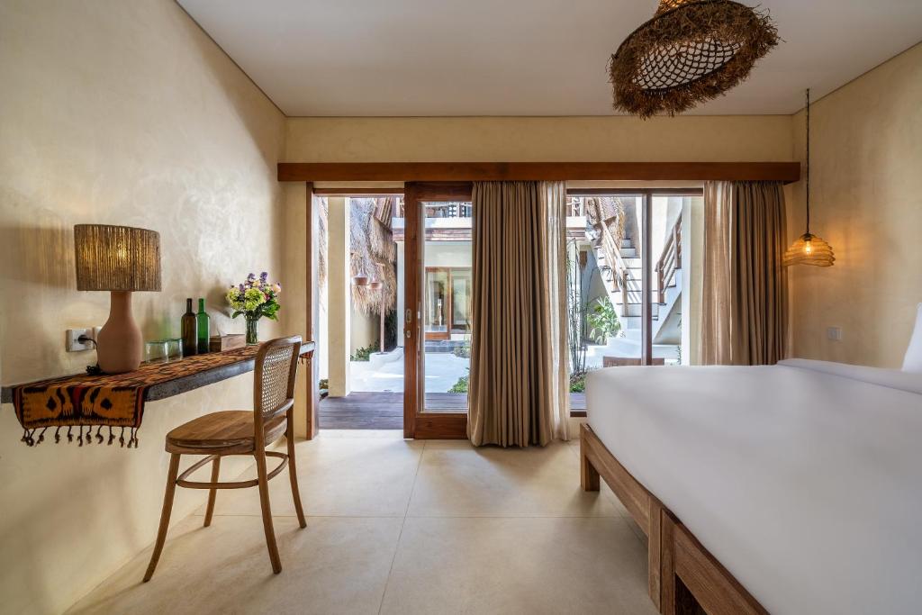 Postel nebo postele na pokoji v ubytování Lulu's Villas