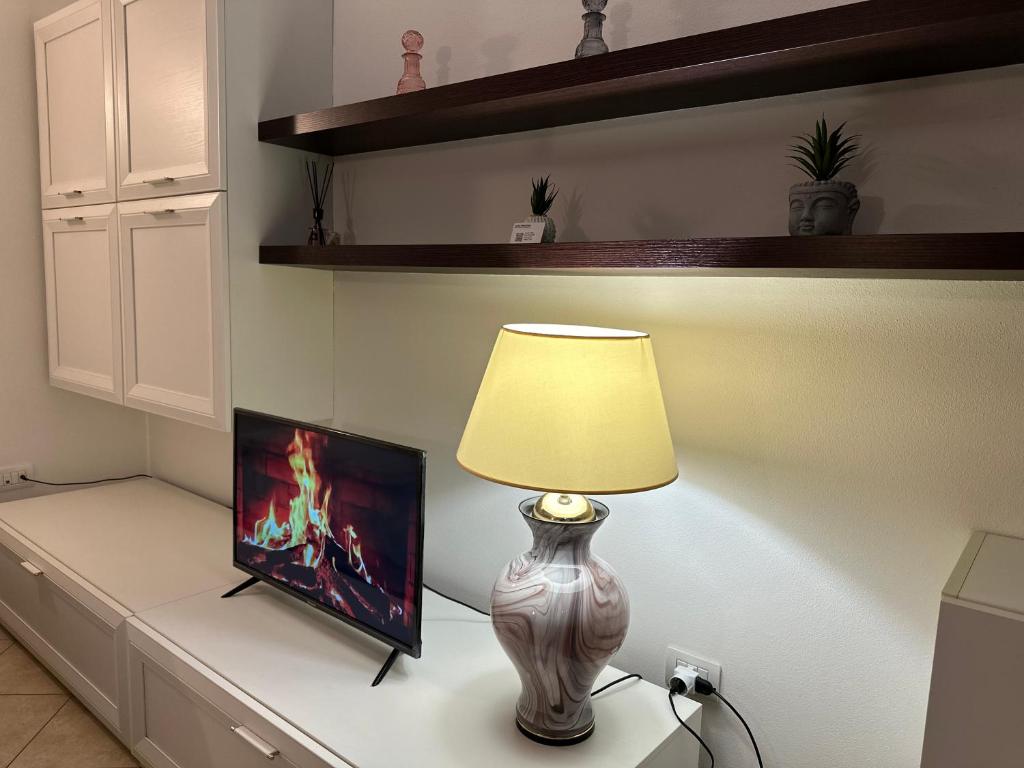 TV a/nebo společenská místnost v ubytování Val di Non Apartment