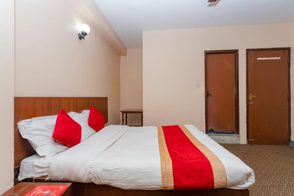 Postel nebo postele na pokoji v ubytování OYO 801 Hotel View Global