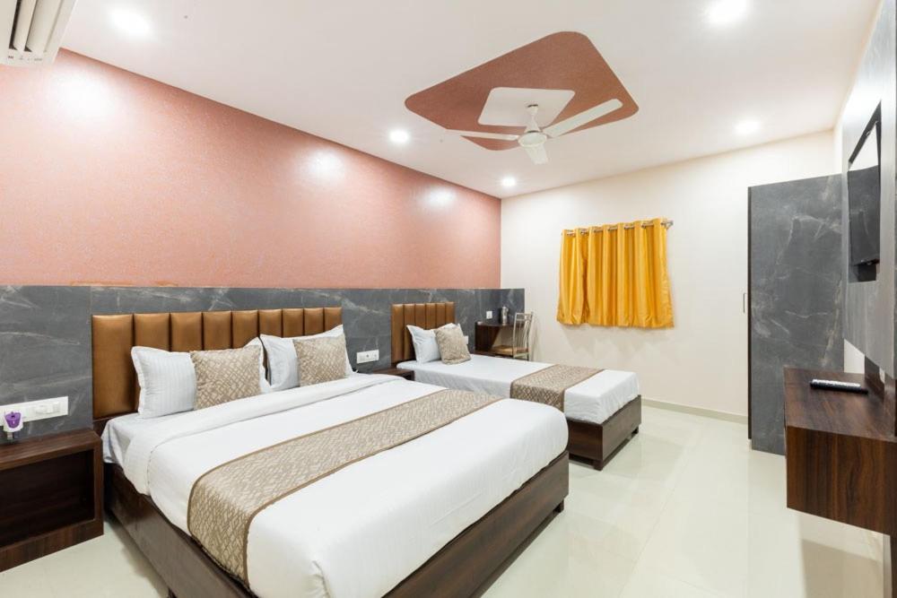 Hotel BKC AN NEX tesisinde bir odada yatak veya yataklar