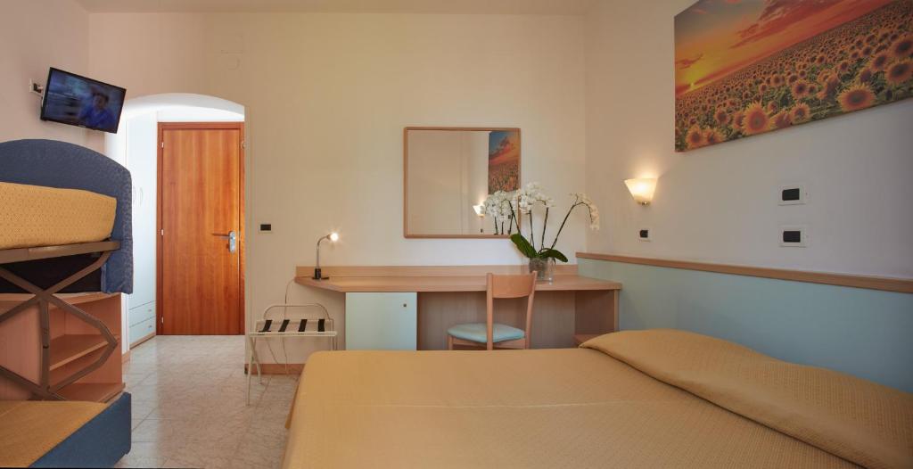 Postel nebo postele na pokoji v ubytování Hotel Pelikan
