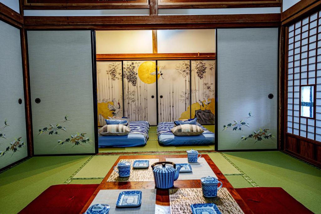 Letto o letti in una camera di 一宿一景一生縁-千葉県市原市小谷田店