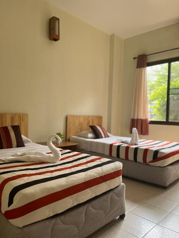 Postel nebo postele na pokoji v ubytování Chat Residence Hotel