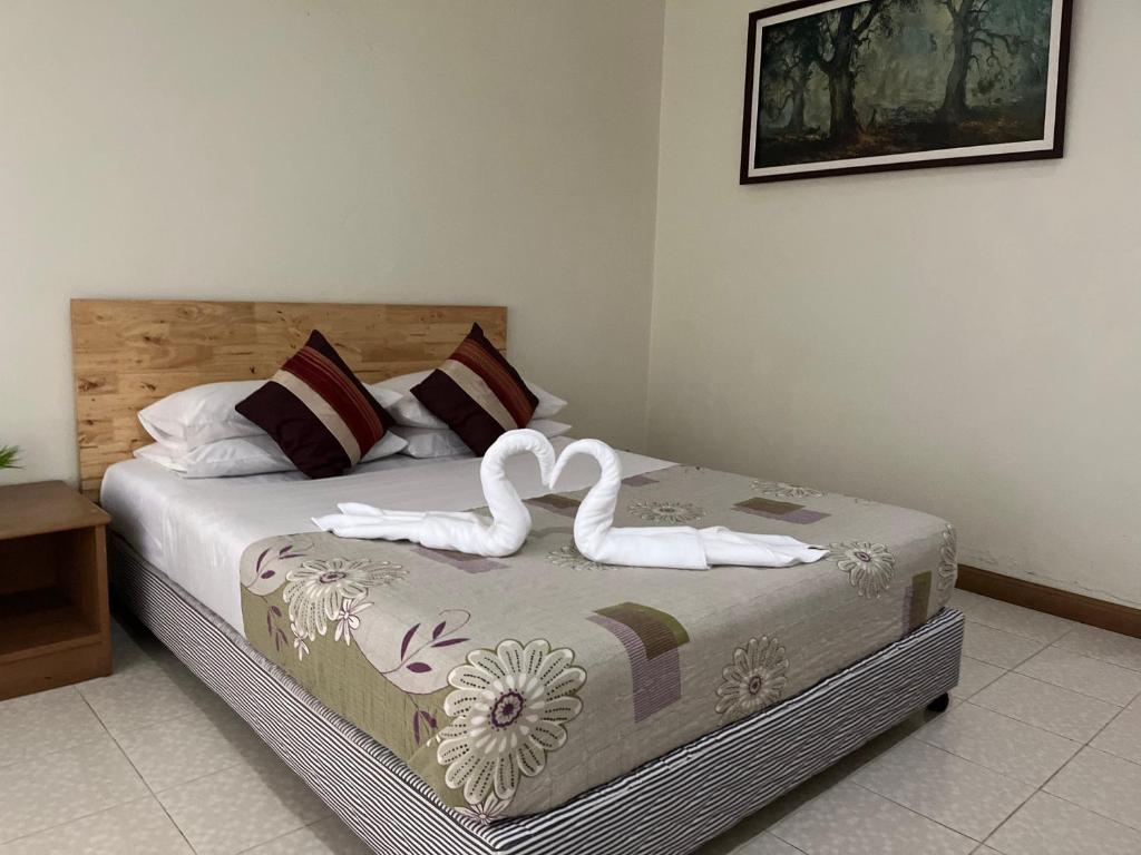 Postel nebo postele na pokoji v ubytování Chat Residence Hotel