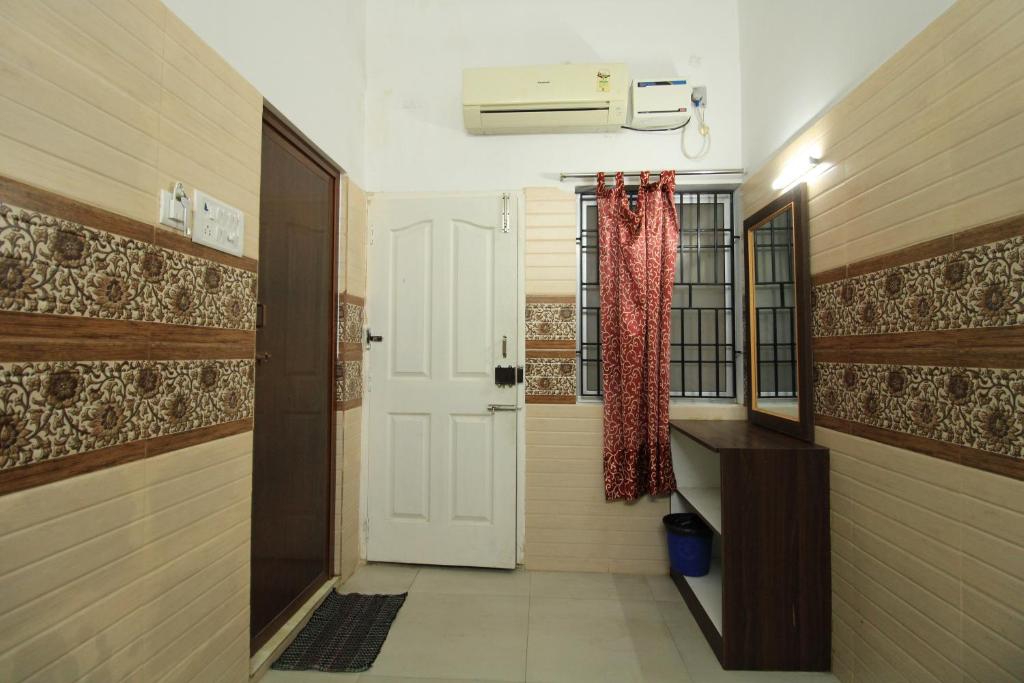 Kuchyň nebo kuchyňský kout v ubytování Just Guest House, Chennai Airport