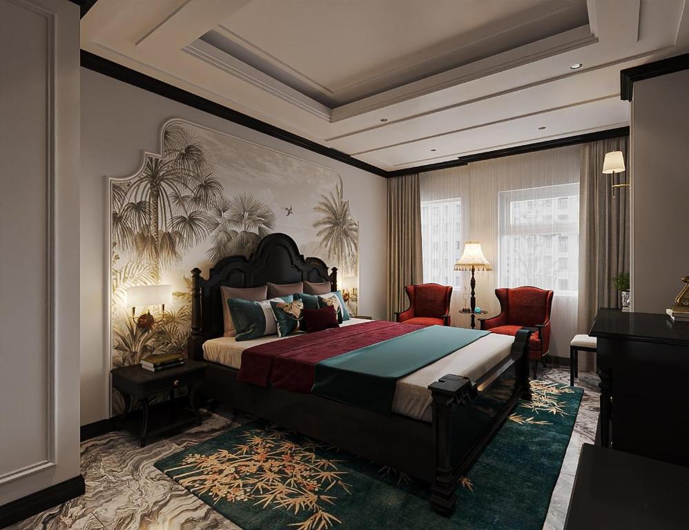 胡志明市的住宿－Nicecy Saigon Hotel，一间卧室配有一张特大号床。