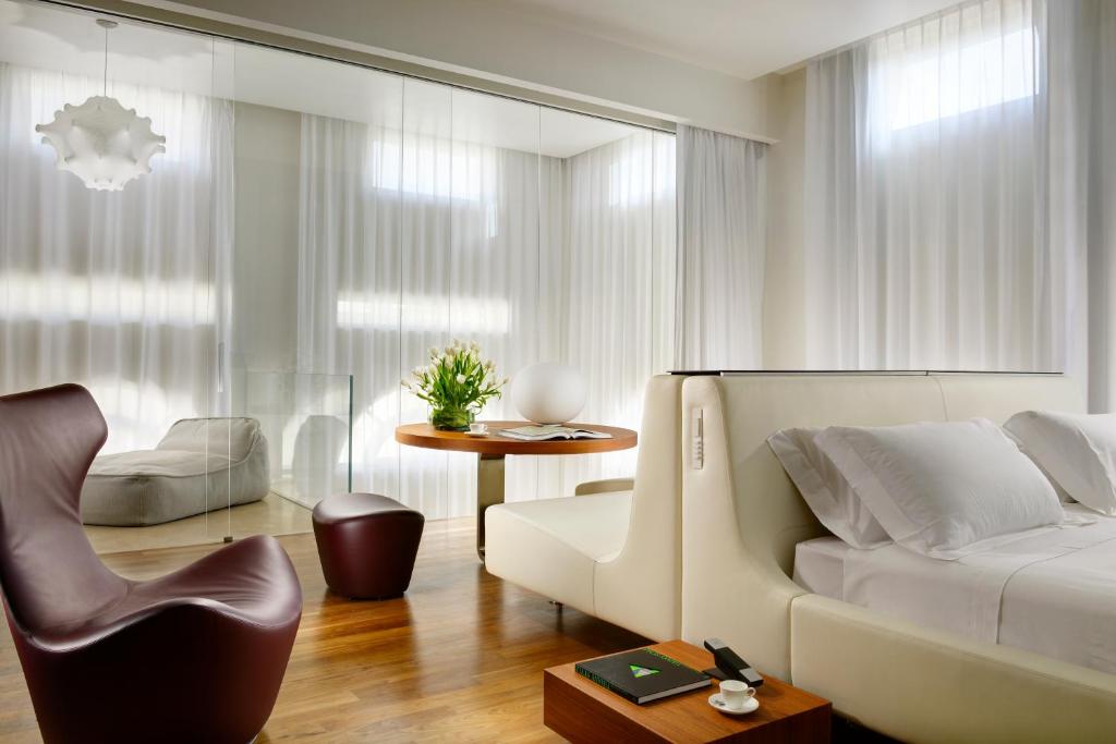 Posezení v ubytování Palazzo Montemartini Rome, A Radisson Collection Hotel