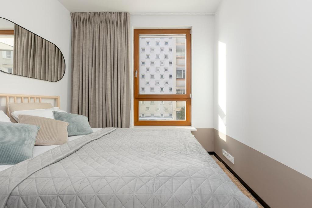 Posteľ alebo postele v izbe v ubytovaní Apartments Arsenal Warsaw City Center by Noclegi Renters