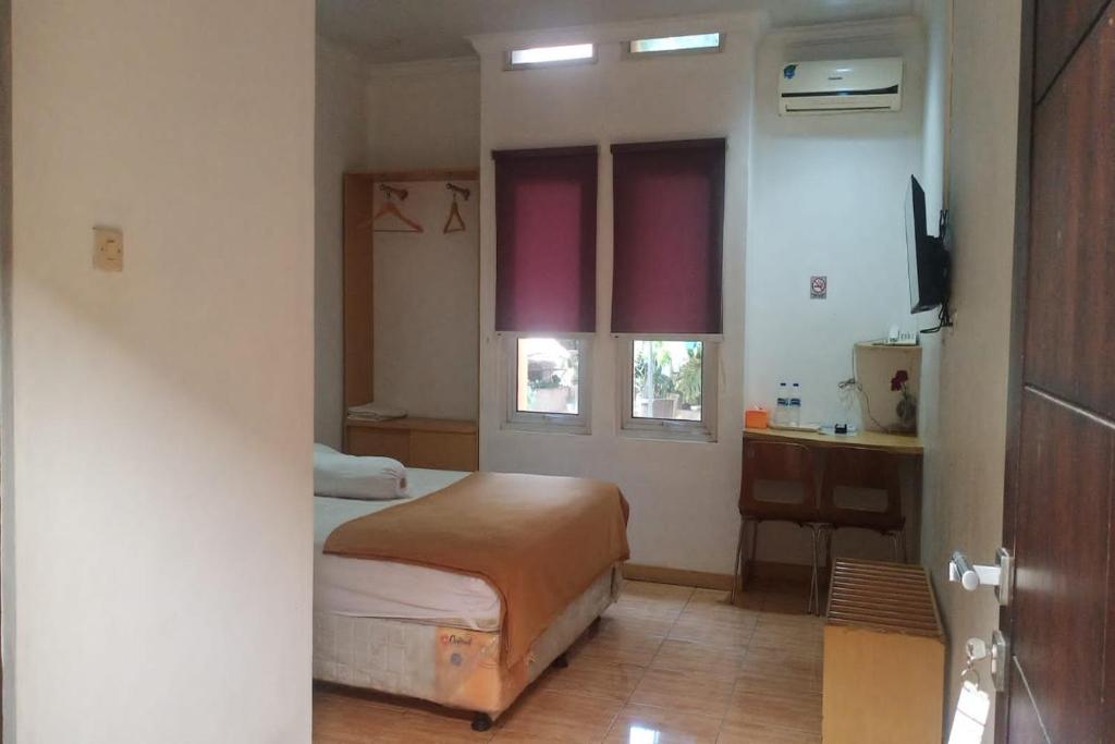 Aryani Suites Syariah - Chambre De Luxe