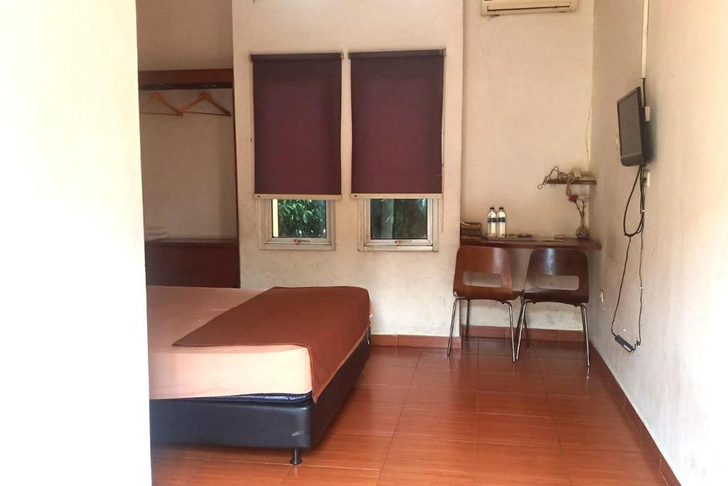 Aryani Suites Syariah - Chambre Double Supérieure