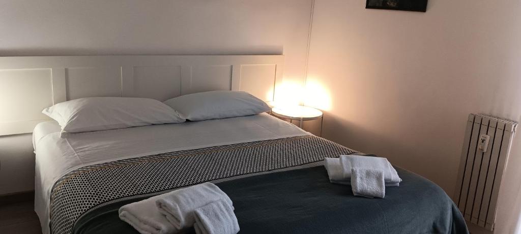 Een bed of bedden in een kamer bij Appartamento Rachele 2