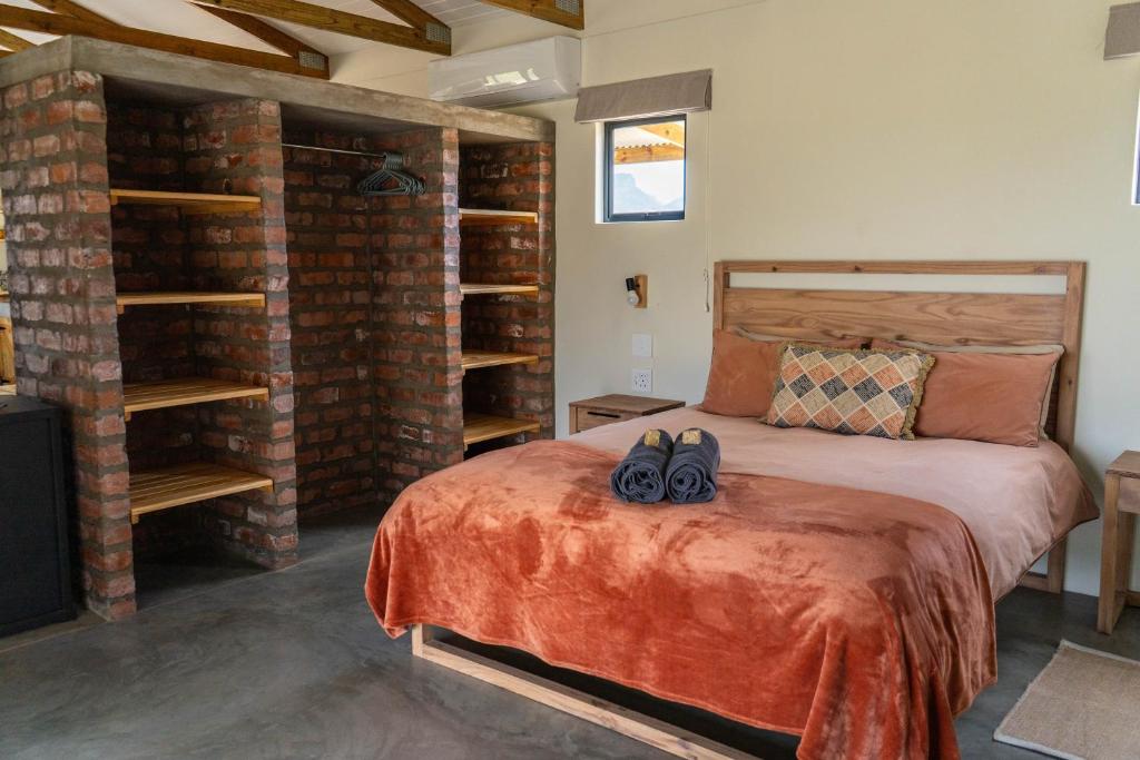 Postel nebo postele na pokoji v ubytování Alpha Excelsior Guest Farm