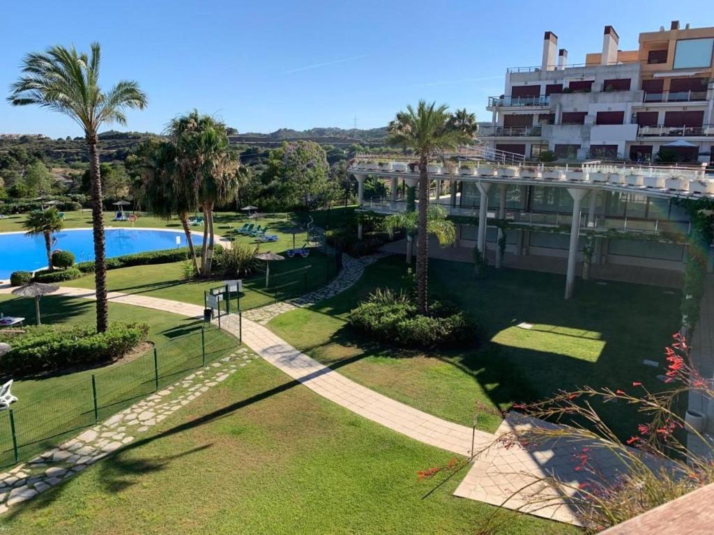 an aerial view of a resort with a swimming pool at Parque Botanico Resort in Estepona
