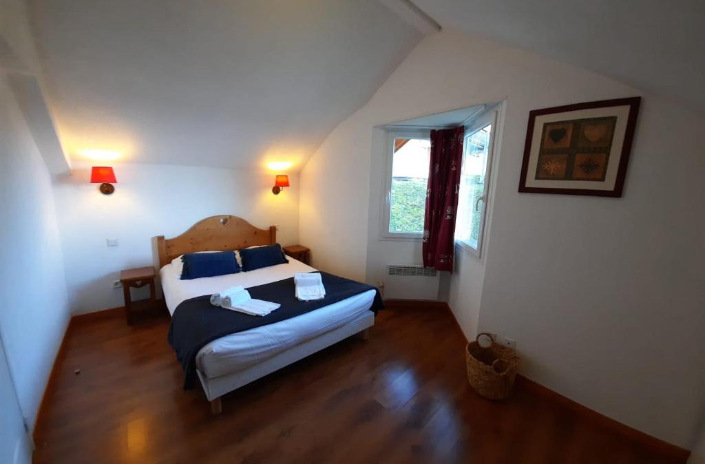 Posteľ alebo postele v izbe v ubytovaní Duplex-Chalet entre Lac et Montagne avec Balcon