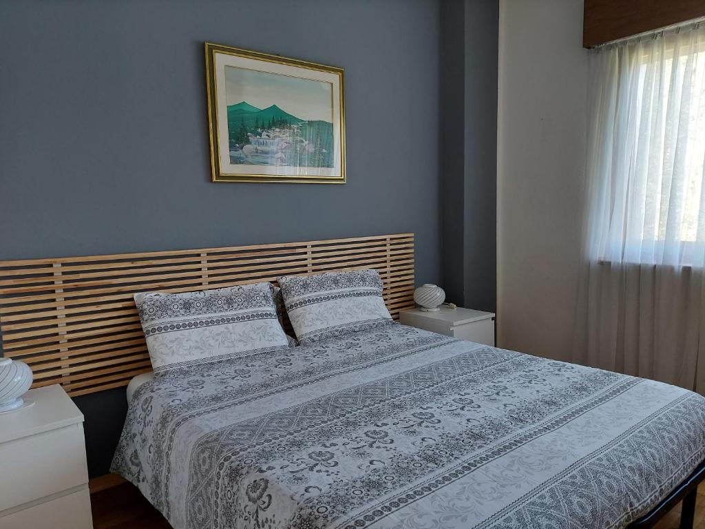 Postel nebo postele na pokoji v ubytování La Casetta nelle Dolomiti