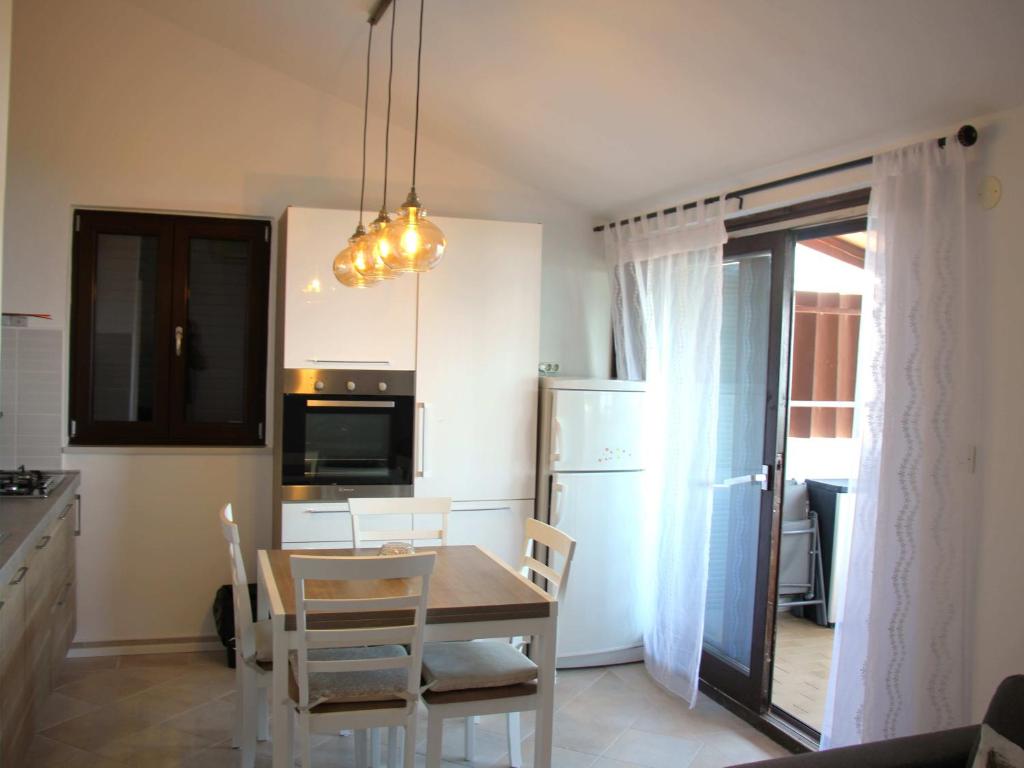 Kuchyň nebo kuchyňský kout v ubytování Apartman Ravni 158
