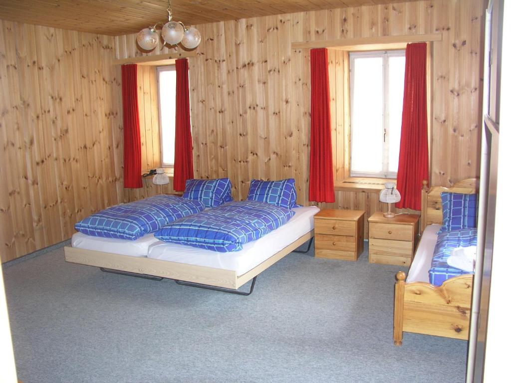 Postel nebo postele na pokoji v ubytování Hotel Quellenhof