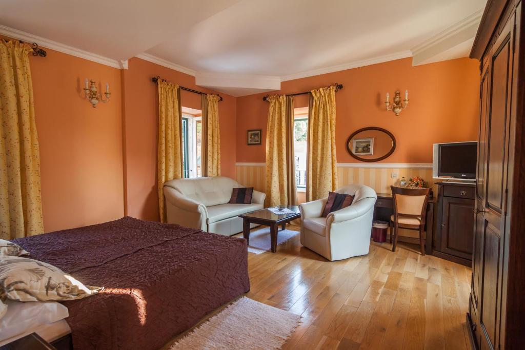 Postel nebo postele na pokoji v ubytování Boutique Hotel Villa Pattiera
