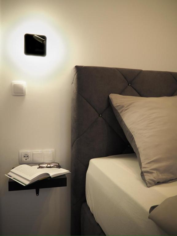 Postel nebo postele na pokoji v ubytování Loft Schottenau