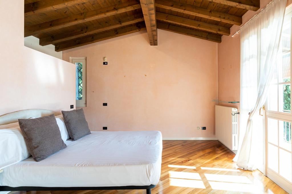 Postel nebo postele na pokoji v ubytování Hotel Désirée - Garda Lake Collection