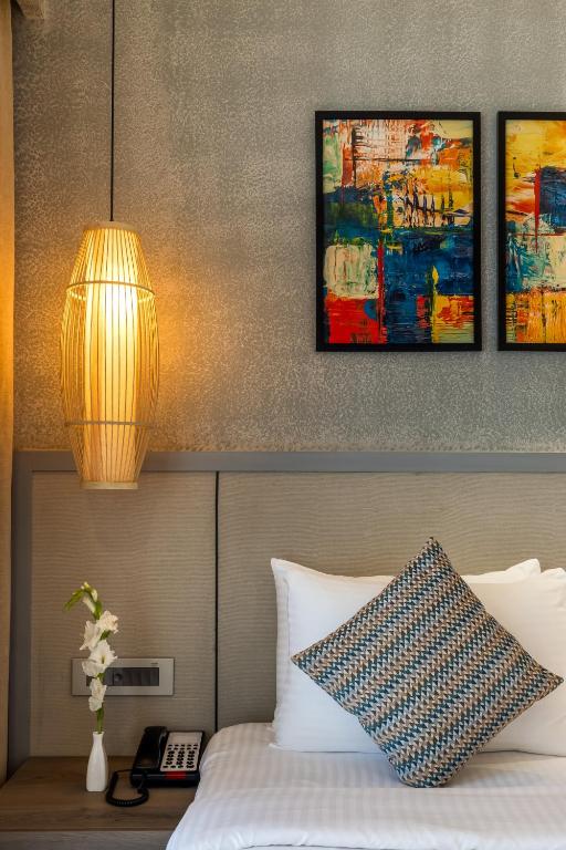 Postel nebo postele na pokoji v ubytování Clarion Hotel Ocean Palms Goa