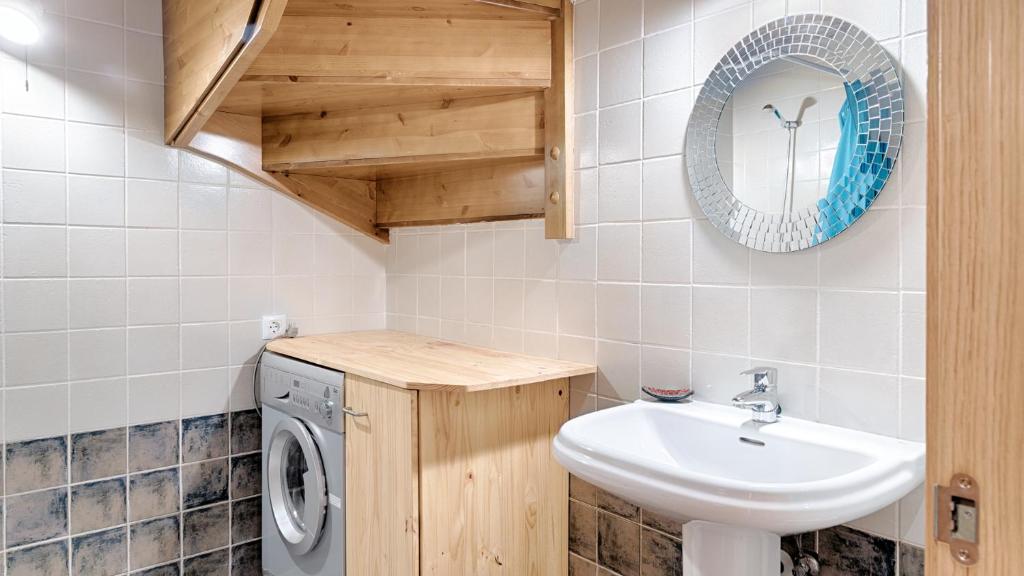 Koupelna v ubytování Saplan Real Estate DUPLEX LONGUERA