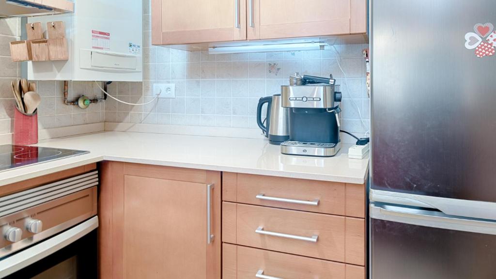 Kuchyň nebo kuchyňský kout v ubytování Saplan Real Estate DUPLEX LONGUERA