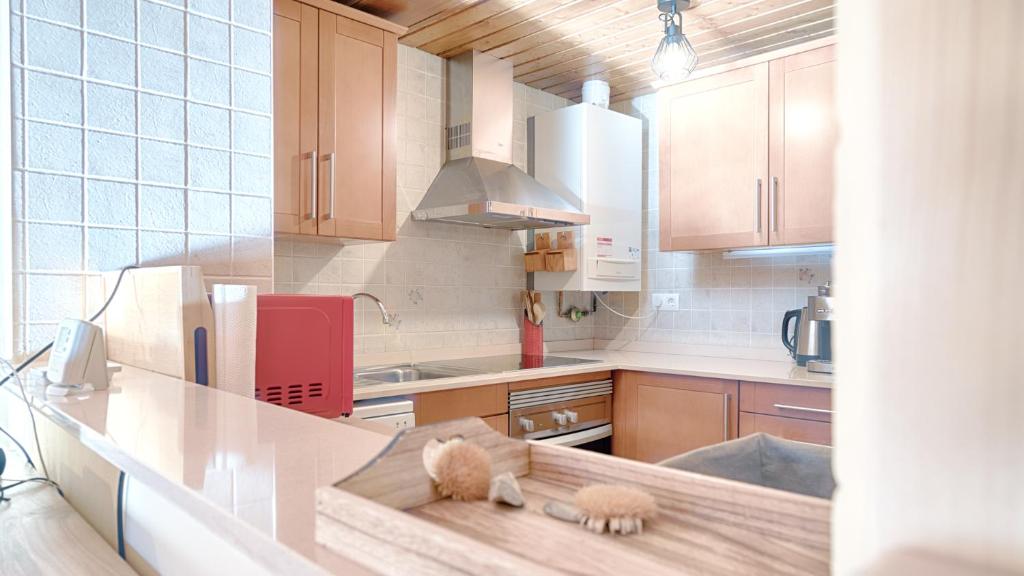 Kuchyň nebo kuchyňský kout v ubytování Saplan Real Estate DUPLEX LONGUERA