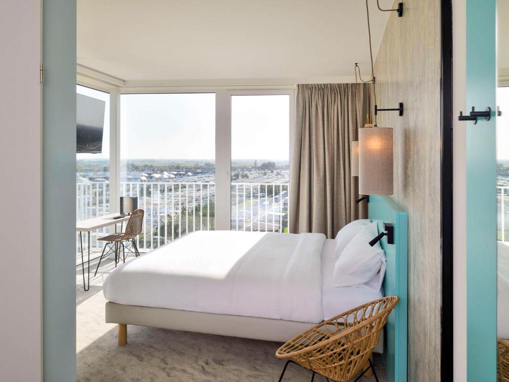 Postel nebo postele na pokoji v ubytování ibis Styles Bredene