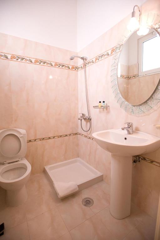 Koupelna v ubytování Hotel Urania
