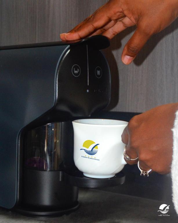 Příslušenství pro přípravu čaje a kávy v ubytování Hotel Belvedere Mindelo, Cabo Verde