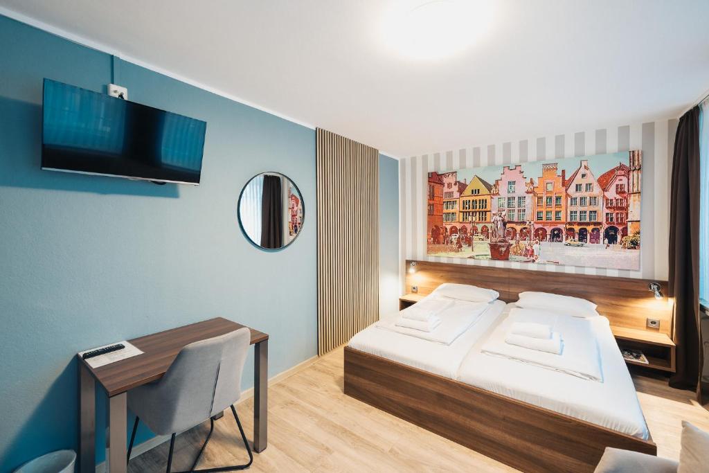 Postel nebo postele na pokoji v ubytování Hotel Busche am Dom