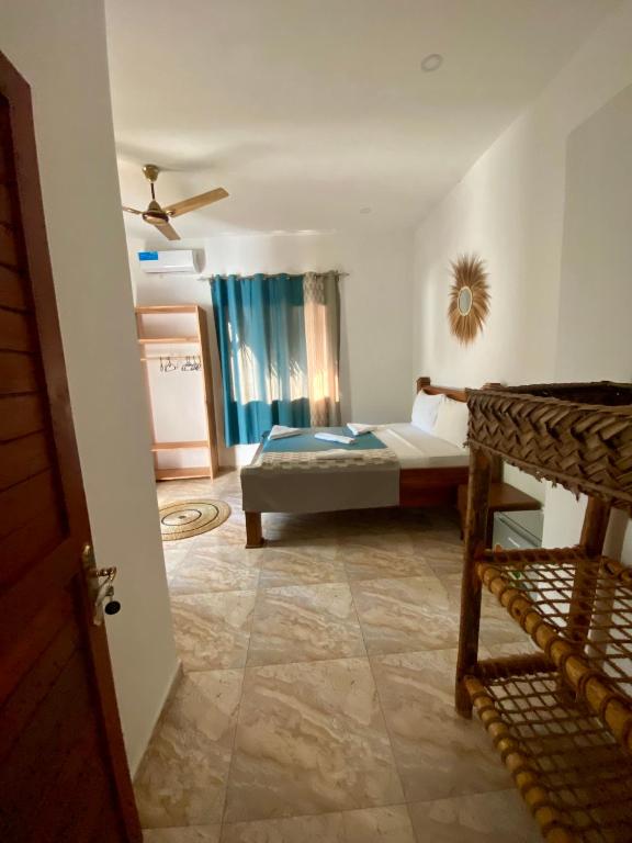 Postel nebo postele na pokoji v ubytování CeZeRe THE PALM HOTEL