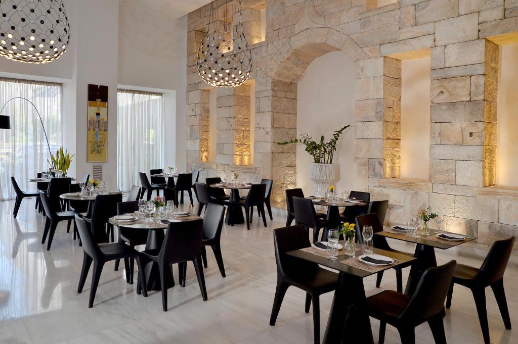 Reštaurácia alebo iné gastronomické zariadenie v ubytovaní Athenaeum Grand Hotel