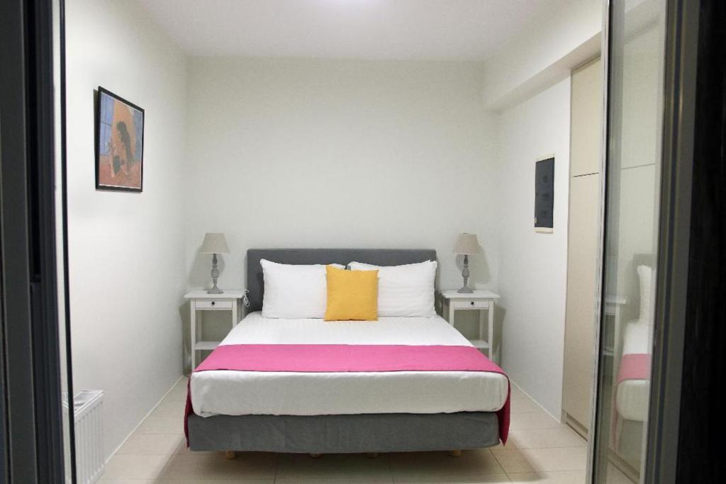 Posteľ alebo postele v izbe v ubytovaní VIVIAN Art Apartments
